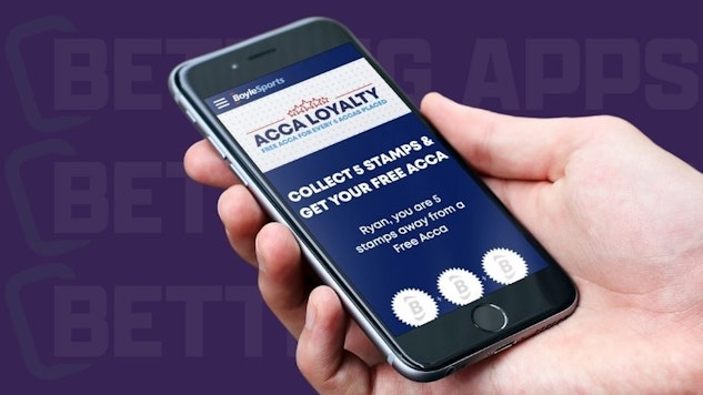 Reviewer holding iphone displaying Boyle Sports app acca loyalty screen
